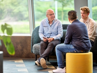 Employees discussing