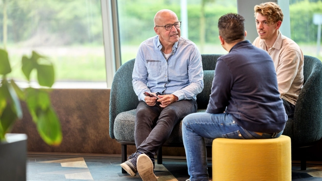 Employees discussing