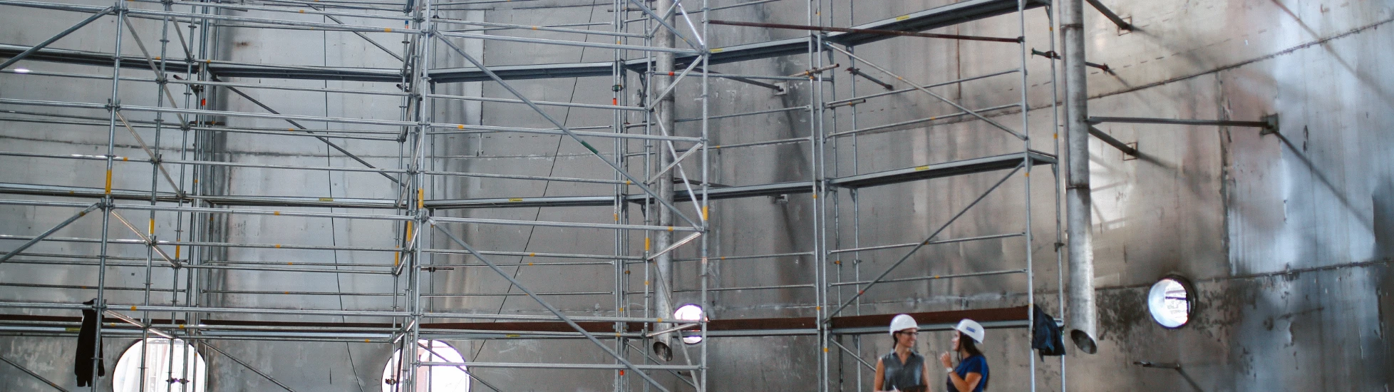 Two female construction workers talking