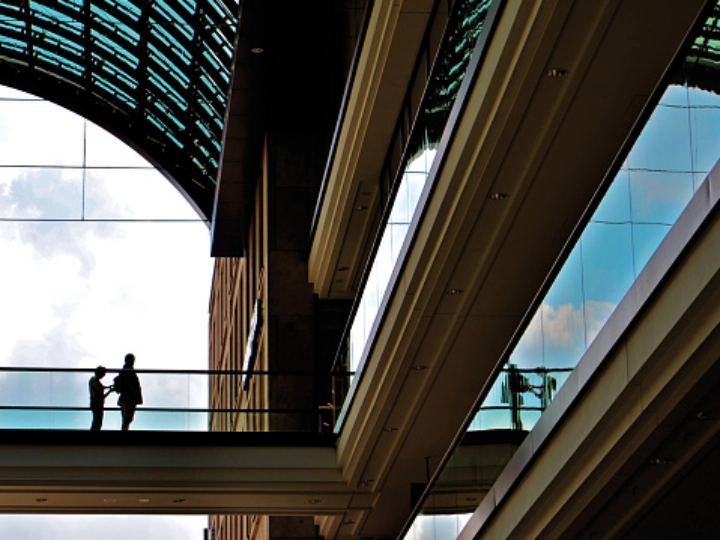 To be purchasedgettyimages-991199244-170667a two people standing under an arch of building